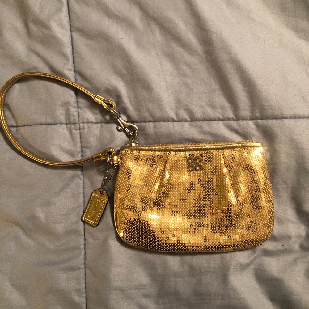 Coach gold sequin wristlet